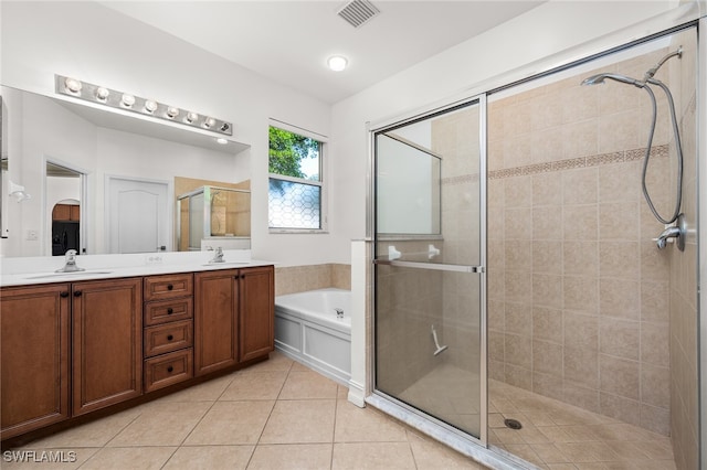 bathroom with vanity, tile patterned flooring, and separate shower and tub