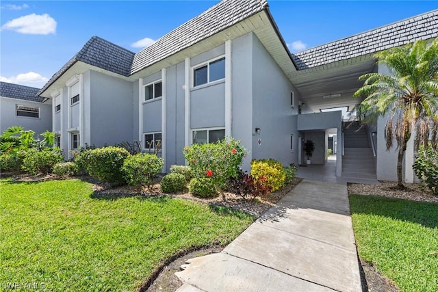 exterior space featuring a front yard