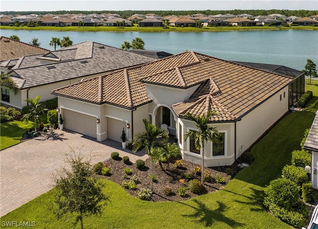 bird's eye view with a water view