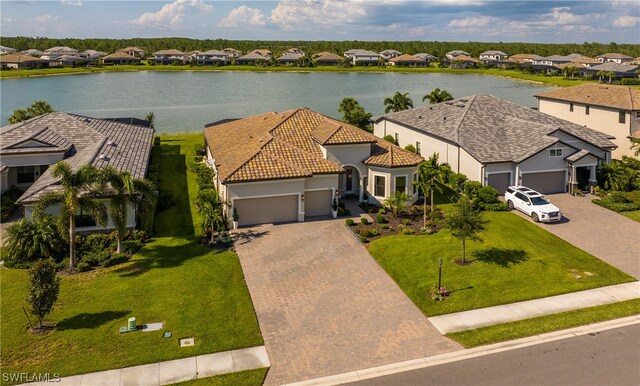 drone / aerial view featuring a water view