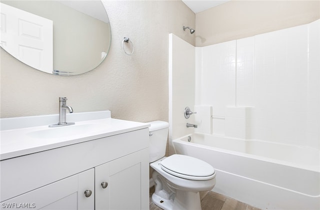 full bathroom with vanity, wood-type flooring,  shower combination, and toilet