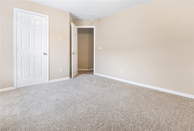 unfurnished bedroom with carpet floors