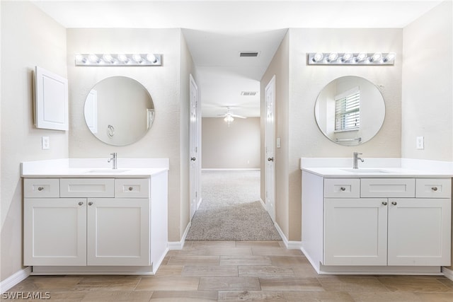 bathroom with vanity and ceiling fan