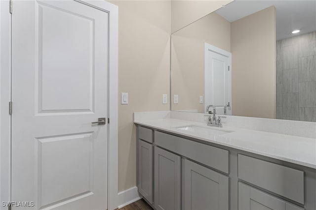 bathroom featuring vanity and hardwood / wood-style floors