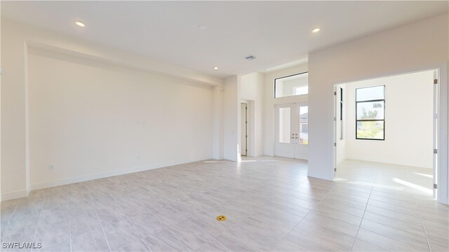 empty room featuring light tile patterned flooring