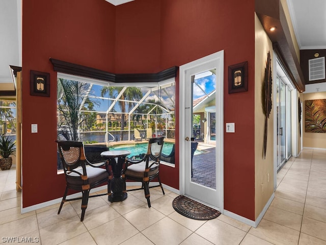 dining area with light tile floors and plenty of natural light