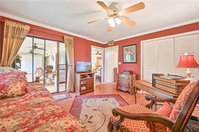 interior space featuring crown molding and light hardwood / wood-style floors