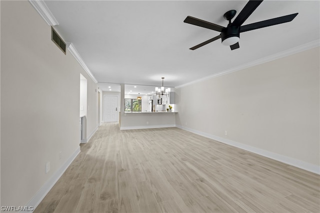 unfurnished living room featuring crown molding, ceiling fan with notable chandelier, and light hardwood / wood-style flooring