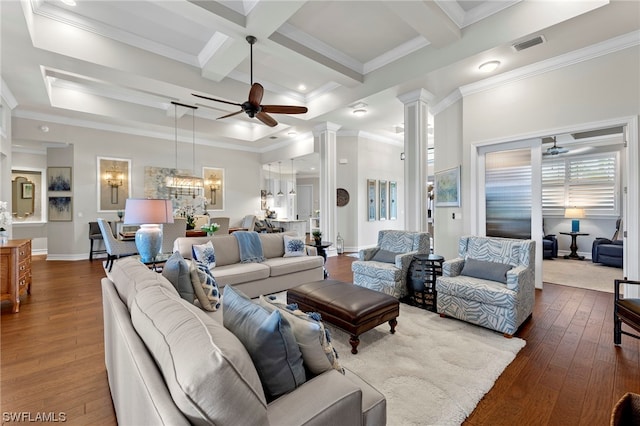 living room featuring ceiling fan with notable chandelier, dark wood-type flooring, beamed ceiling, and coffered ceiling