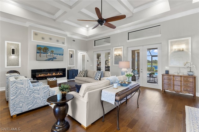 living room with ceiling fan, beam ceiling, french doors, and coffered ceiling