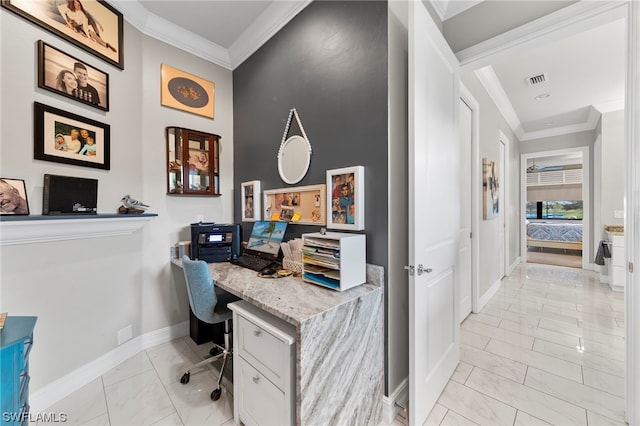 home office featuring crown molding and built in desk