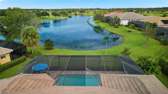 view of swimming pool featuring a lanai and a water view