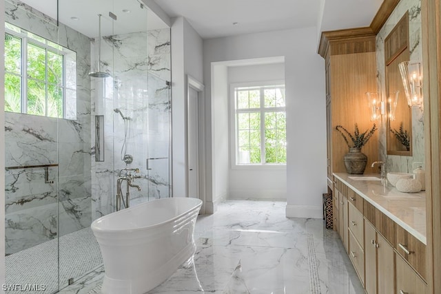 bathroom with tile flooring, separate shower and tub, and vanity