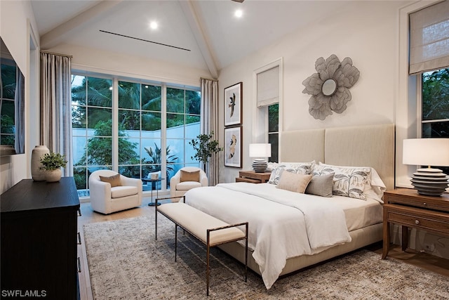 bedroom with beamed ceiling, high vaulted ceiling, and light hardwood / wood-style flooring