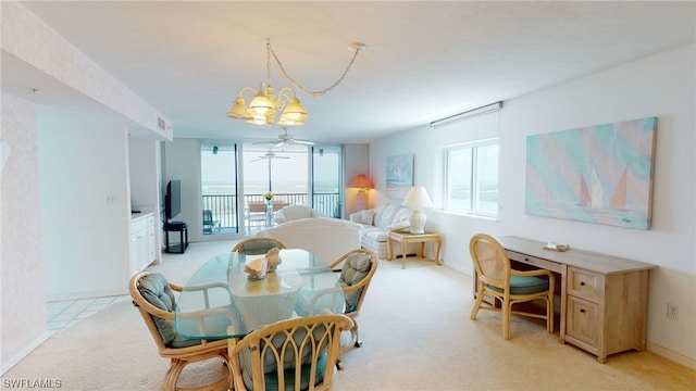 4753 Estero Blvd Unit 1005, Fort Myers Beach, FL 33931 - dining space featuring light colored carpet, ceiling fan, a desk, and a chandelier
