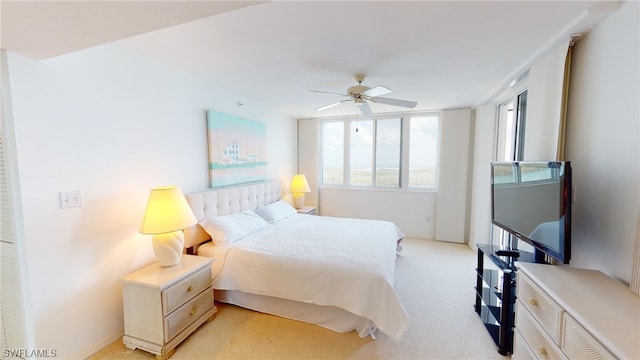 4753 Estero Blvd Unit 1005, Fort Myers Beach, FL 33931 - bedroom featuring light colored carpet and ceiling fan