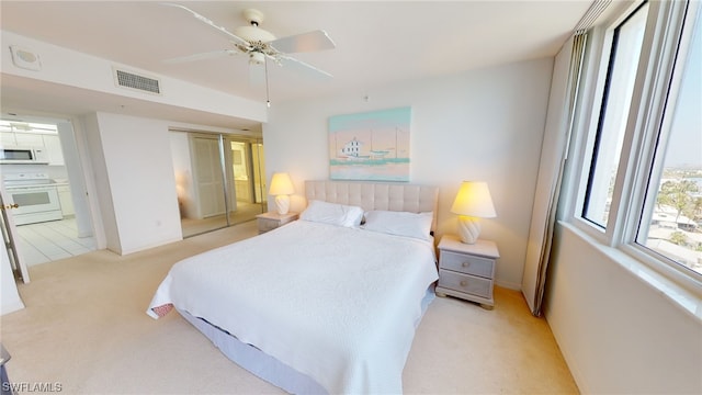 4753 Estero Blvd Unit 1005, Fort Myers Beach, FL 33931 - bedroom featuring light colored carpet, baseboards, a closet, and ensuite bath