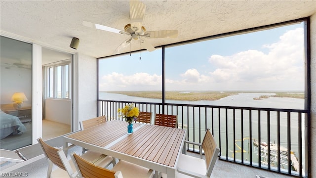 4753 Estero Blvd Unit 1005, Fort Myers Beach, FL 33931 - sunroom with a water view