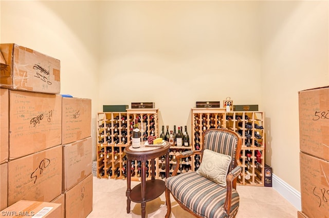 wine cellar with tile patterned flooring and baseboards