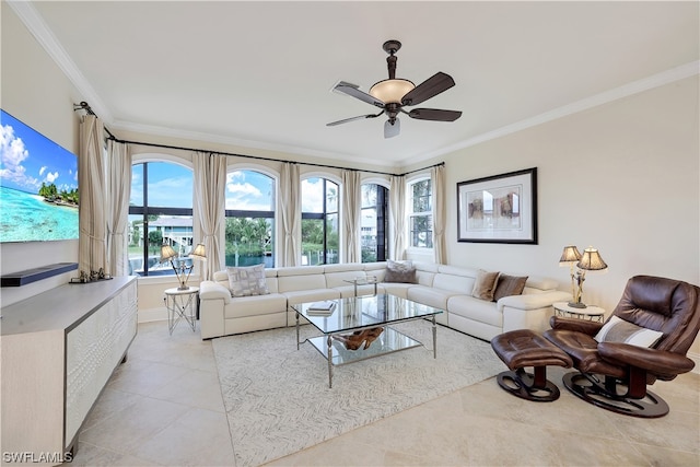 living room featuring light tile floors, crown molding, and ceiling fan