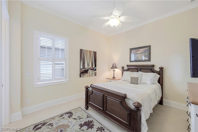 tiled bedroom with ceiling fan and ornamental molding