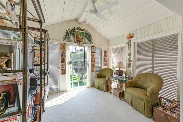 sunroom with vaulted ceiling with beams and ceiling fan