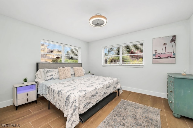 bedroom featuring wood-type flooring