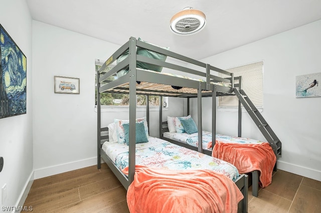 bedroom featuring dark hardwood / wood-style flooring