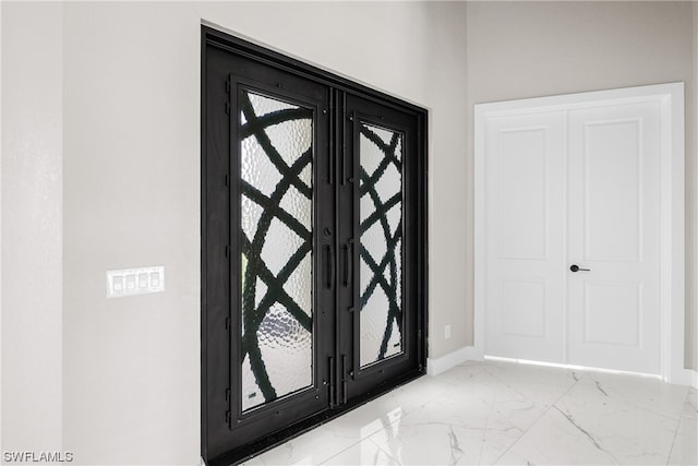 foyer featuring french doors