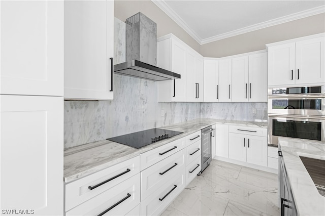 kitchen featuring white cabinetry, light stone countertops, wall chimney range hood, double oven, and black electric cooktop