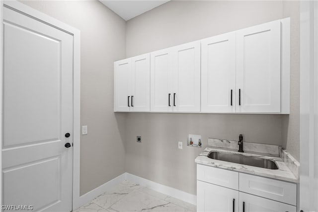 laundry room with hookup for a washing machine, sink, cabinets, and hookup for an electric dryer