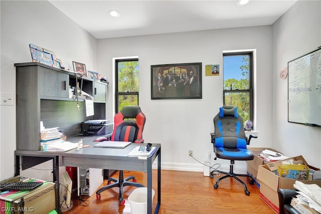 home office featuring light hardwood / wood-style floors