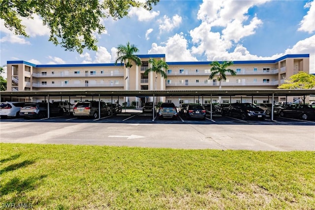 view of parking with a carport