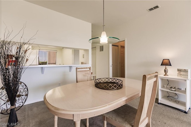 view of carpeted dining space