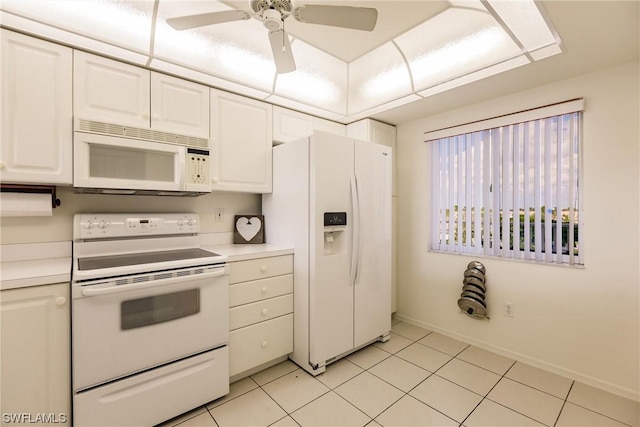 kitchen featuring white cabinetry, white appliances, ceiling fan, and light tile patterned floors