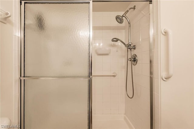 bathroom featuring walk in shower