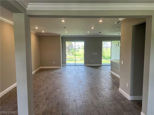 spare room with crown molding