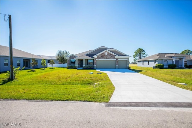 ranch-style house featuring a garage and a front lawn