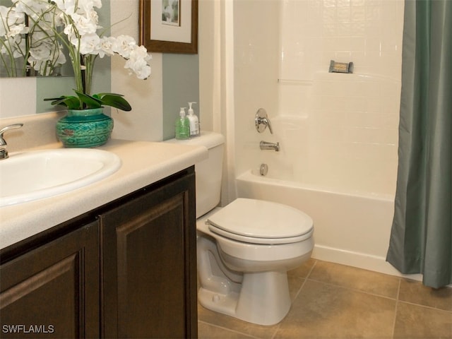 full bathroom featuring shower / tub combo with curtain, vanity, toilet, and tile patterned flooring