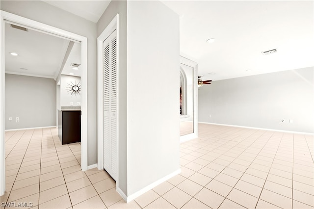 hallway with light tile floors