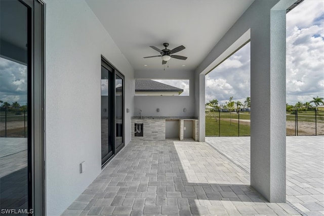 view of terrace with ceiling fan