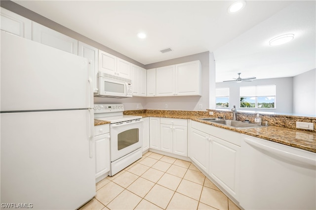 kitchen with white cabinets, ceiling fan, white appliances, and dark stone counters