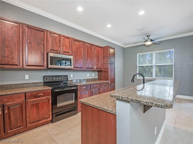 kitchen with black range with electric stovetop, ornamental molding, a center island with sink, and light tile patterned flooring