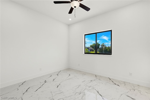 unfurnished room with ceiling fan