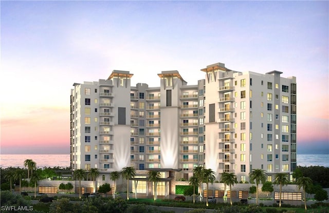 4142 Bay Beach Ln Unit 303, Fort Myers Beach, FL 33931 - view of building exterior with a water view