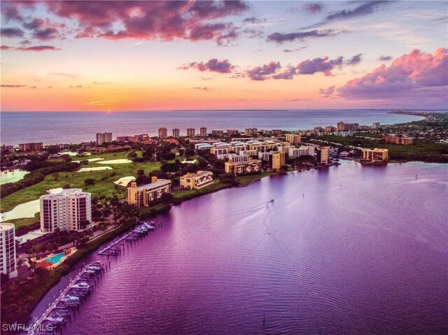 4142 Bay Beach Ln Unit 303, Fort Myers Beach, FL 33931 - drone / aerial view with a water view and a city view