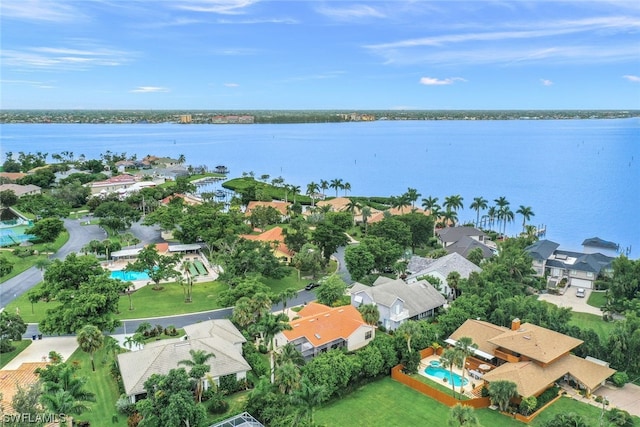 birds eye view of property featuring a water view