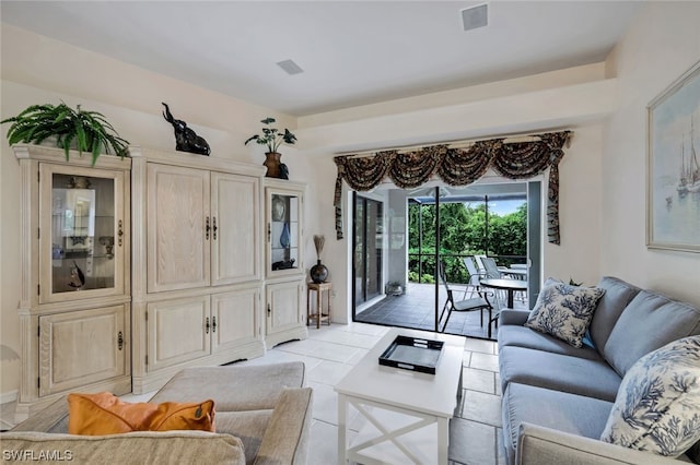 living room with light tile patterned flooring