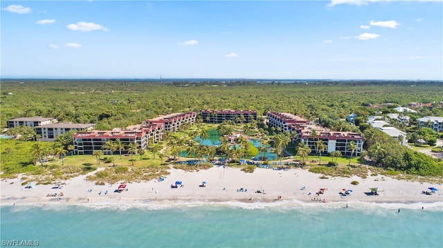 aerial view with a water view and a view of the beach