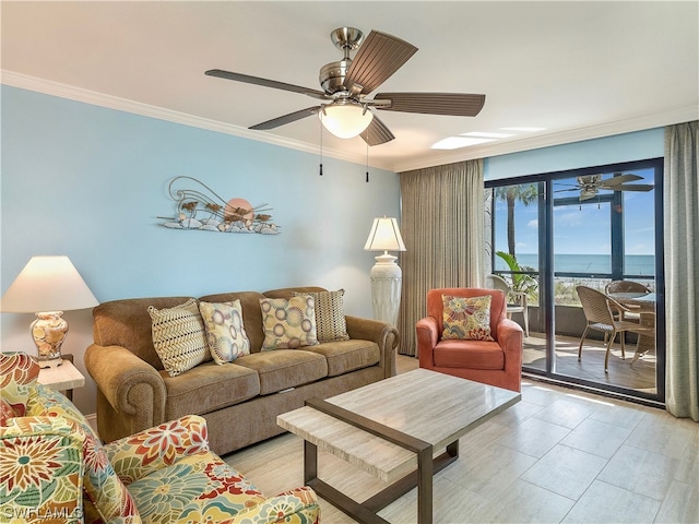 living room featuring crown molding, ceiling fan, and a water view